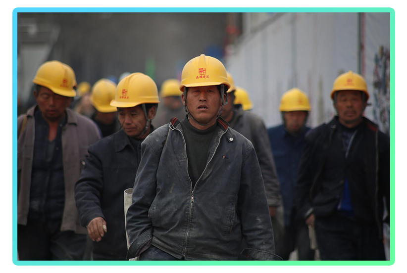 Chinese workers heading to the factory