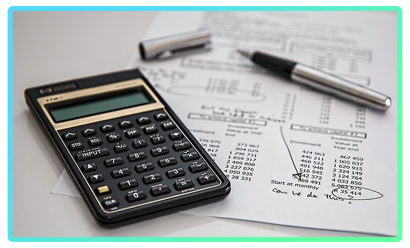 Using a calculator to go over financial records